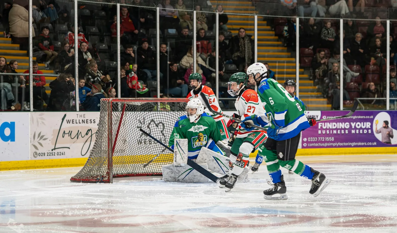 Canucks players in action in front of home supporters